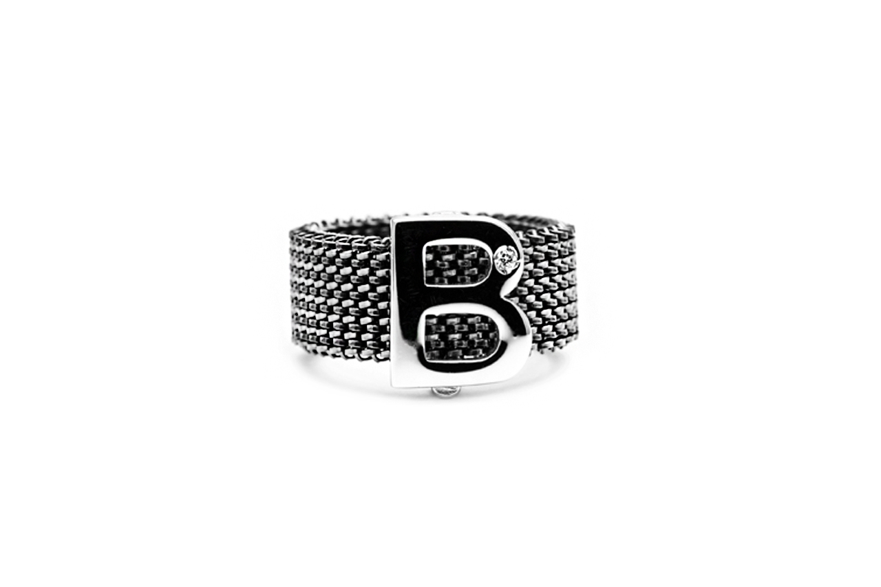 <b>LETTERE </b><br> Anello Lettera Clip in argento con diamante