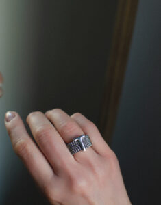 Elastic steel ring with a silver letter
