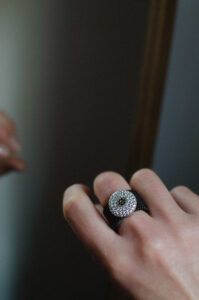 Elastic steel ring with silver decoration and zirconia