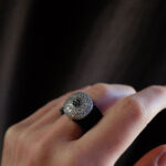 Elastic steel ring with silver decoration and zirconia