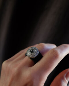 Elastic steel ring with silver decoration and zirconia